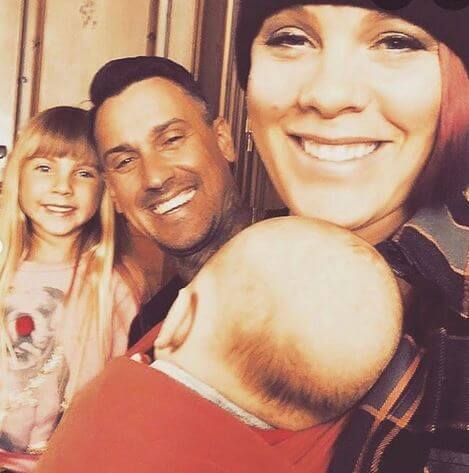 Judith Moore's Daughter, Pink with her husband, Carey Hart and children.